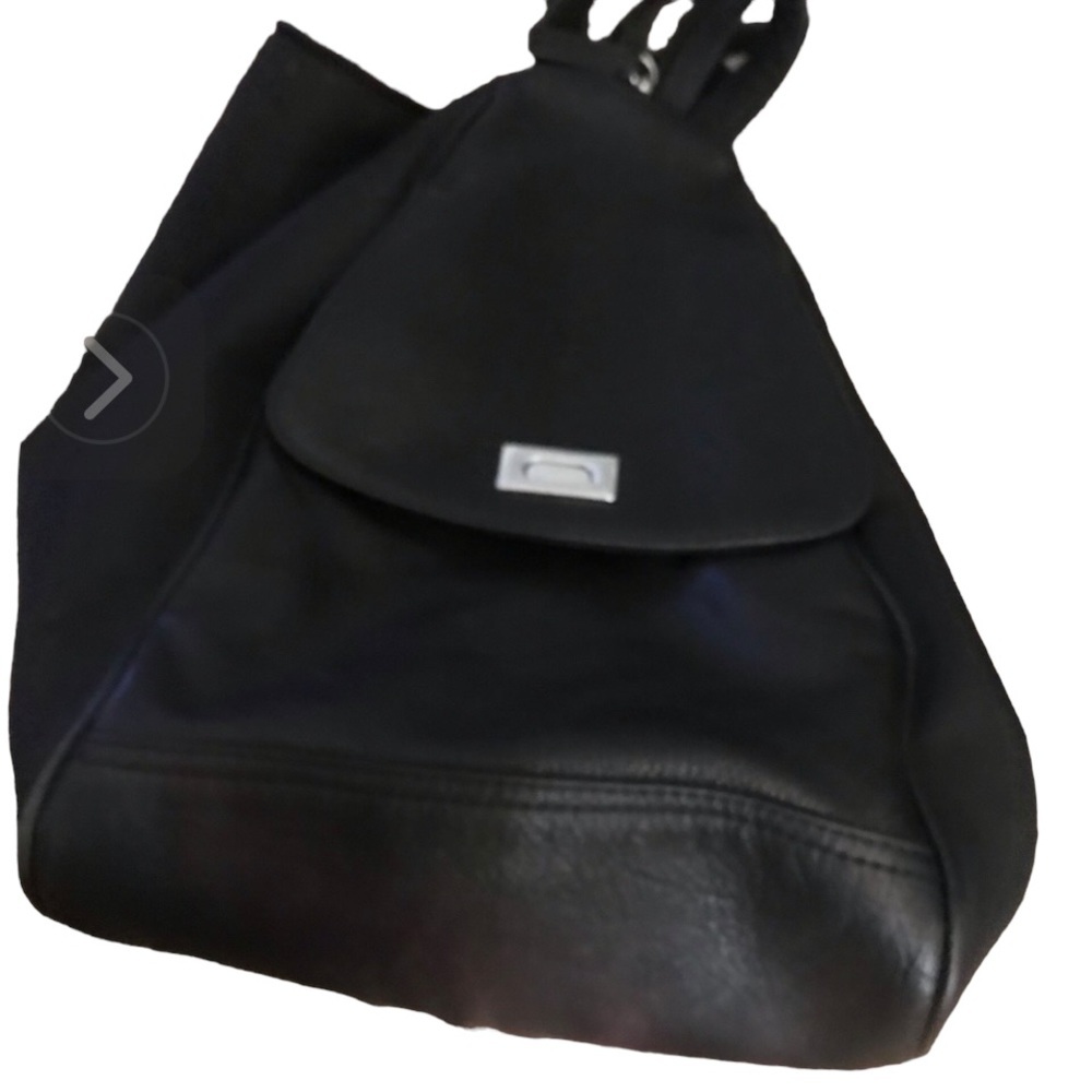 Black sling microfiber & leather shoulder bag / strap unzips to backpack